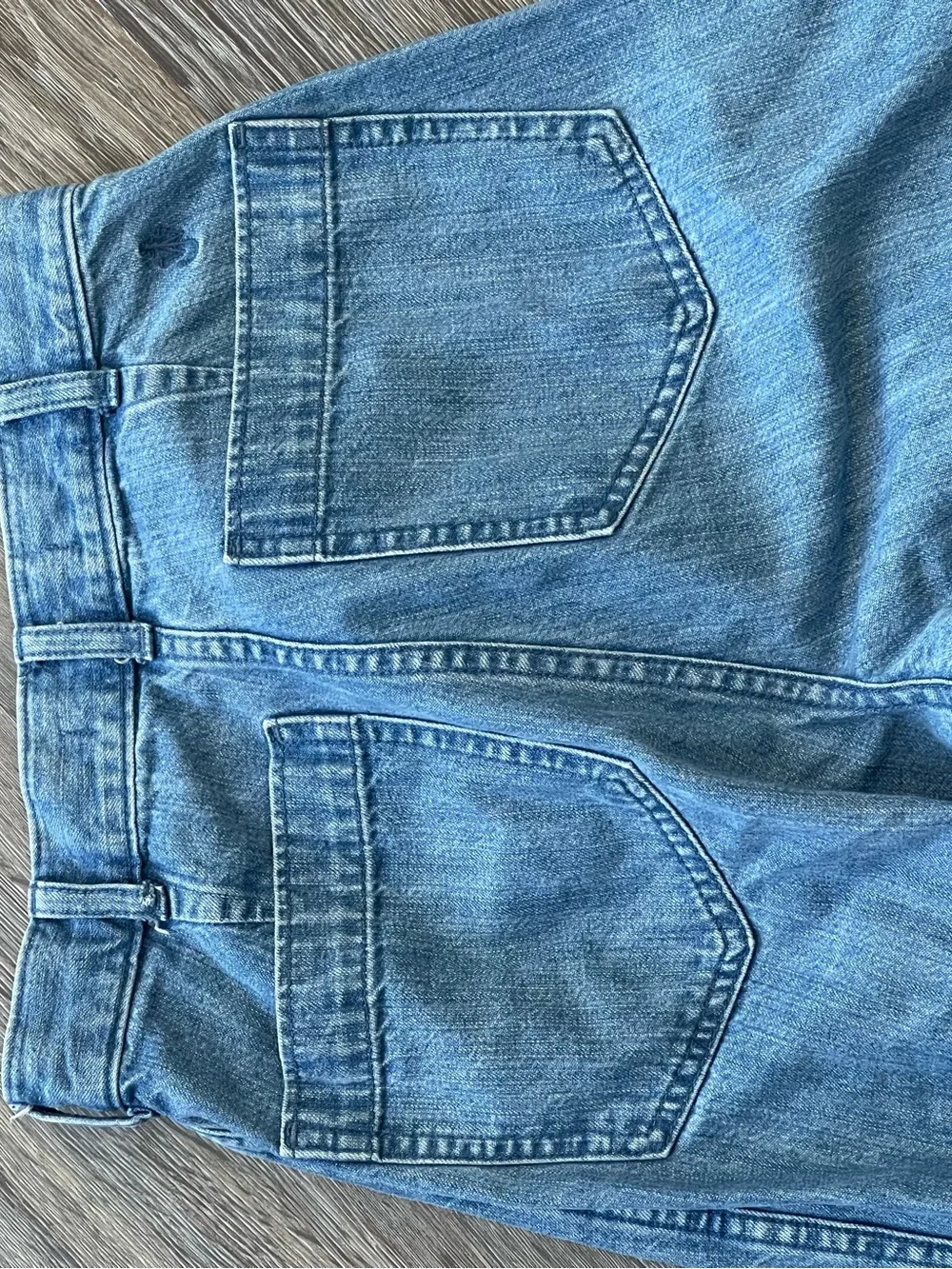 J.W. Anderson x Uniqlo | Flared High Rise Patch Pocket Medium Wash Denim Jeans